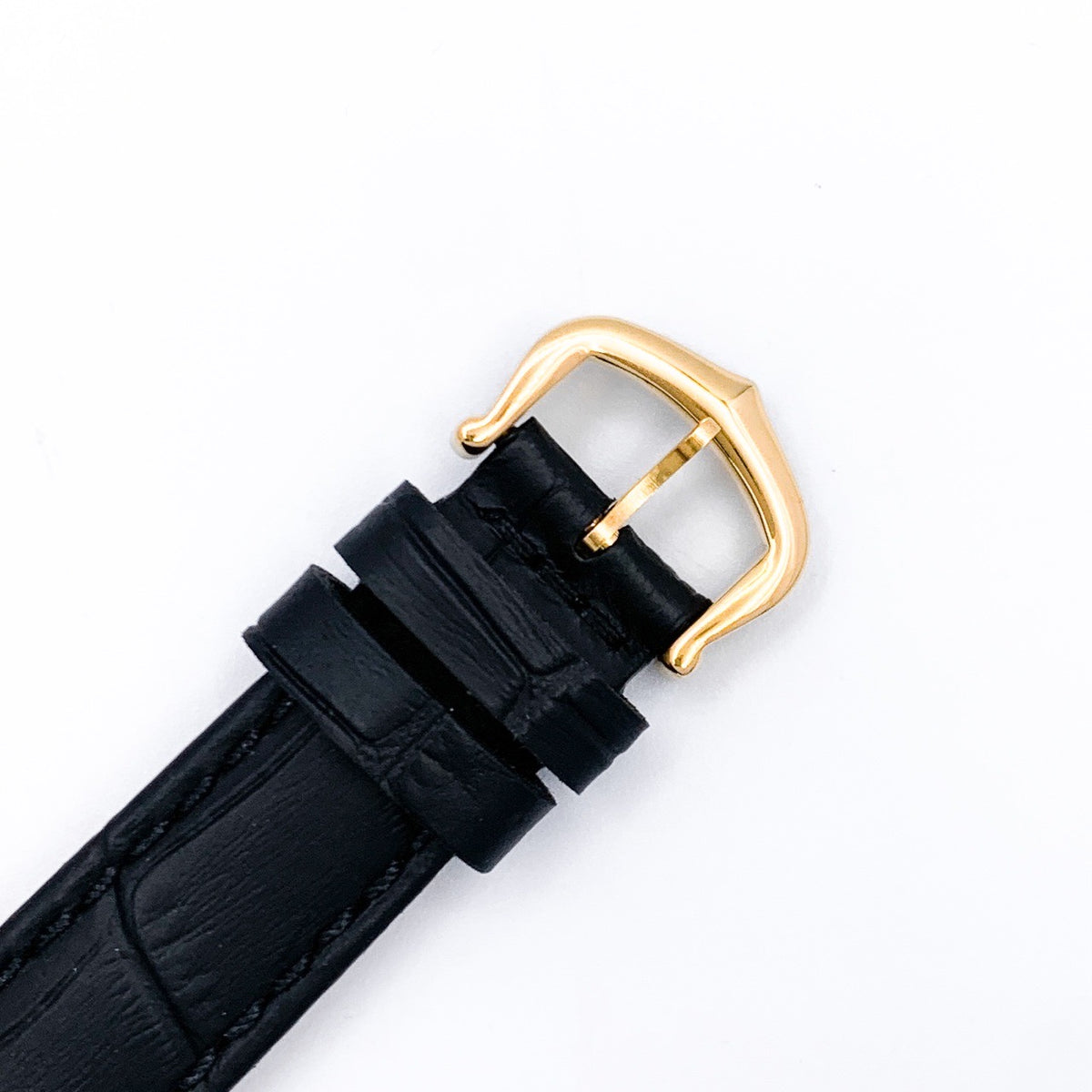 Must Tank, small, vertical Roman numeral dial, gold