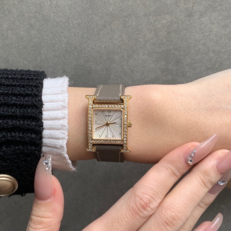 Hウォッチ 白文字盤 ゴールド ダイヤ