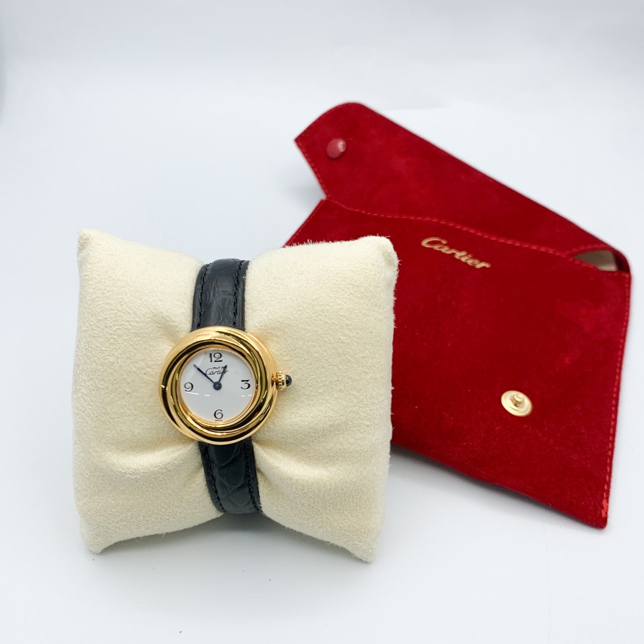 Trinity watch, small model, jumping hour display, Arabic numerals, gold