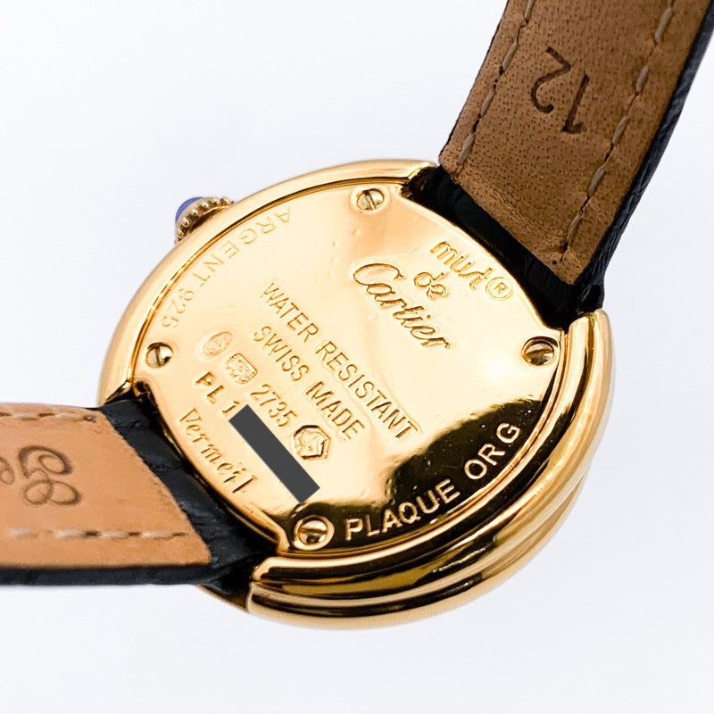 Trinity watch, small model, jumping hour display, Arabic numerals, gold