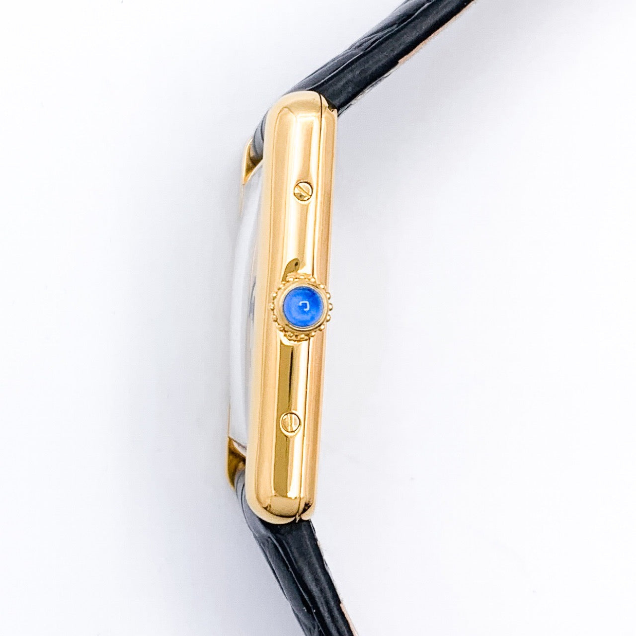 Must Tank LM, vertical Roman numerals, gold dial