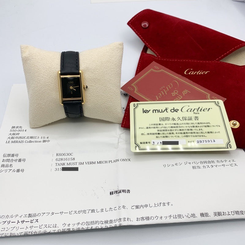Must de Cartier Tank SM, manual-wind, black dial, gold