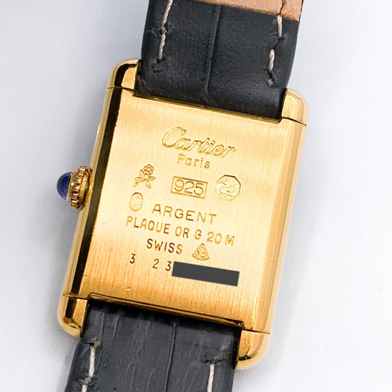 Must Tank SM, manual-winding, beige Roman dial, gold