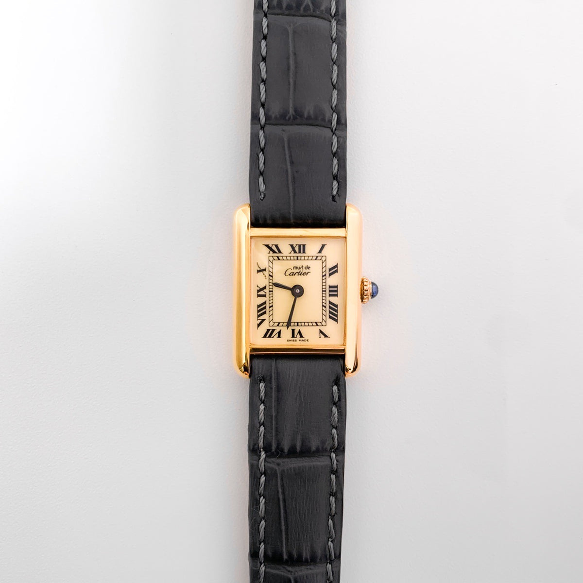Must Tank SM, manual-winding, beige Roman dial, gold
