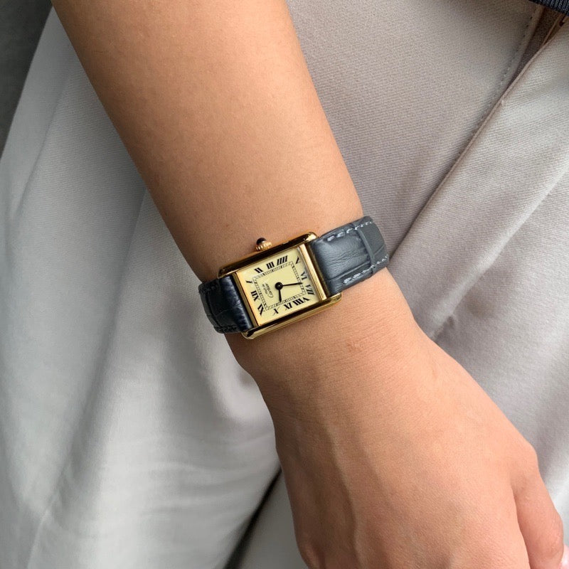 Must Tank SM, manual-winding, beige Roman dial, gold